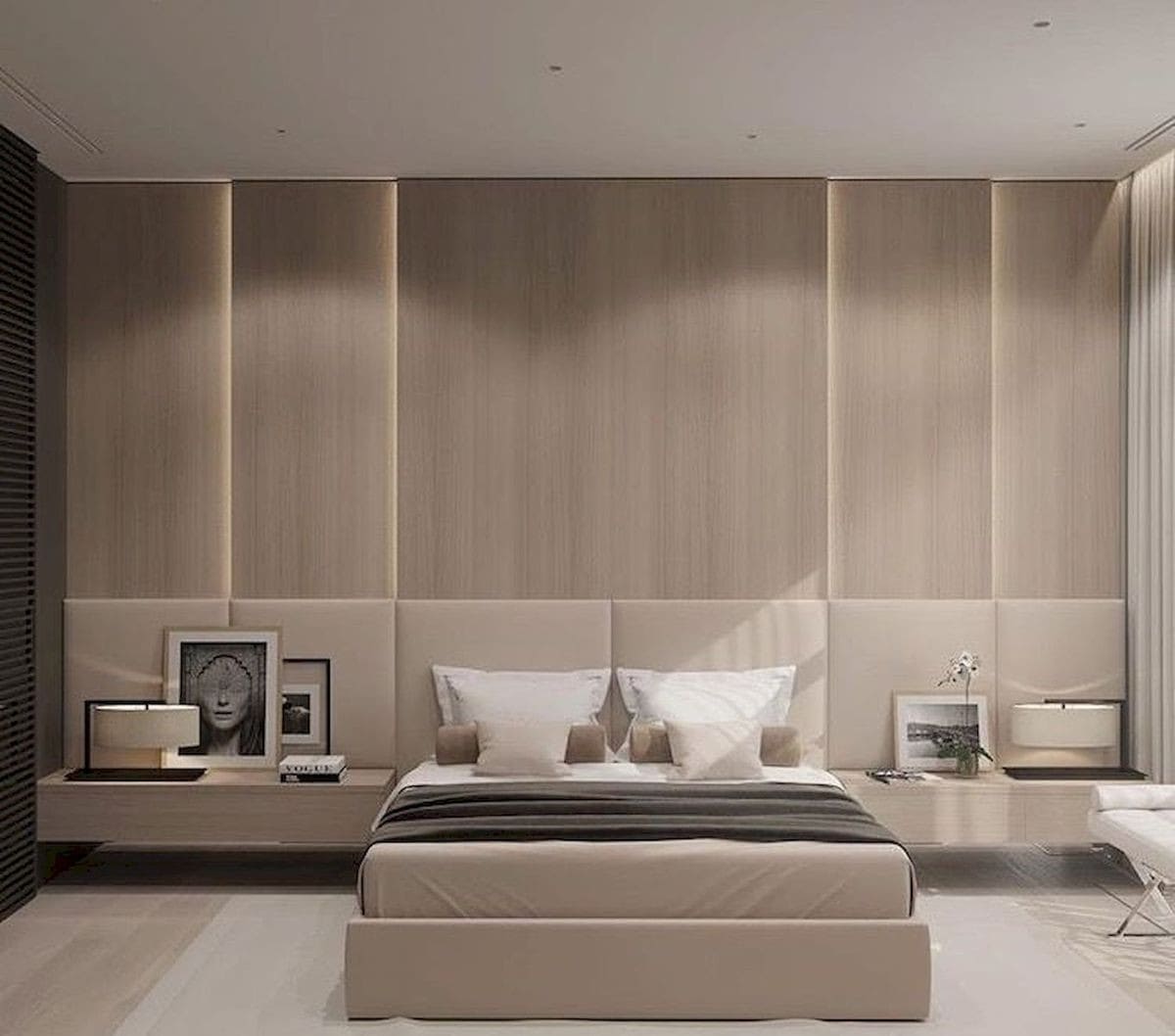 mẫu thiết kế nội thất phòng ngủ với giường bọc nệm và phía đầu giường được ốp gỗ rất đẹp và sang trọng